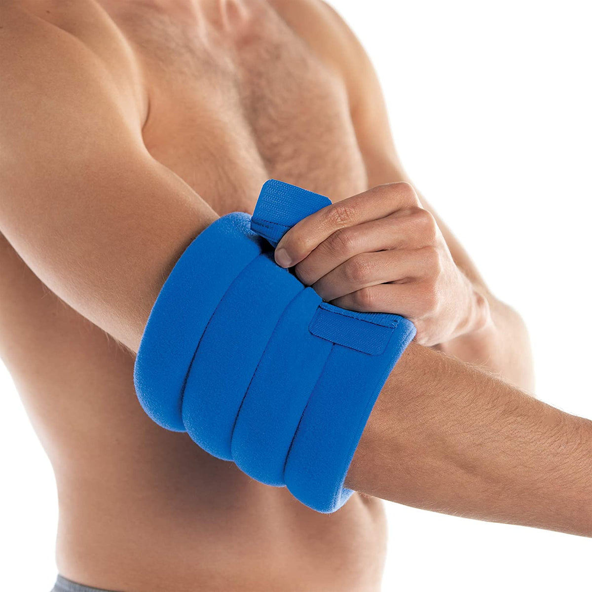 The Bed Buddy Joint Wrap on a male’s elbow