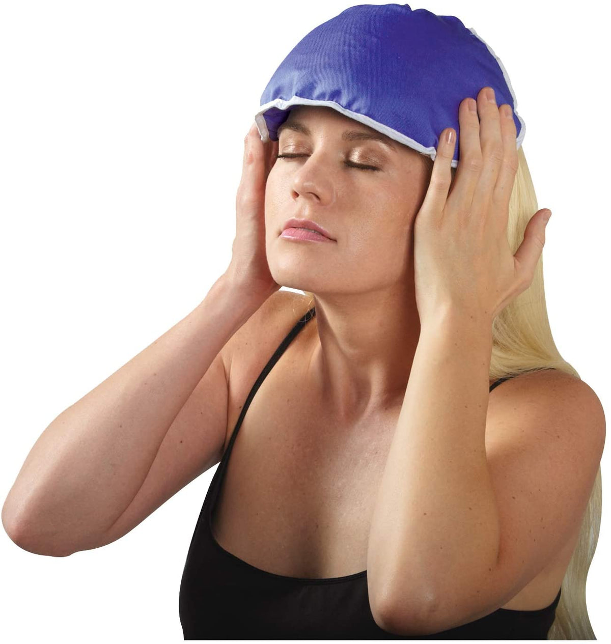 A woman with the ThermiPaq relief wrap over her forehead on a white background