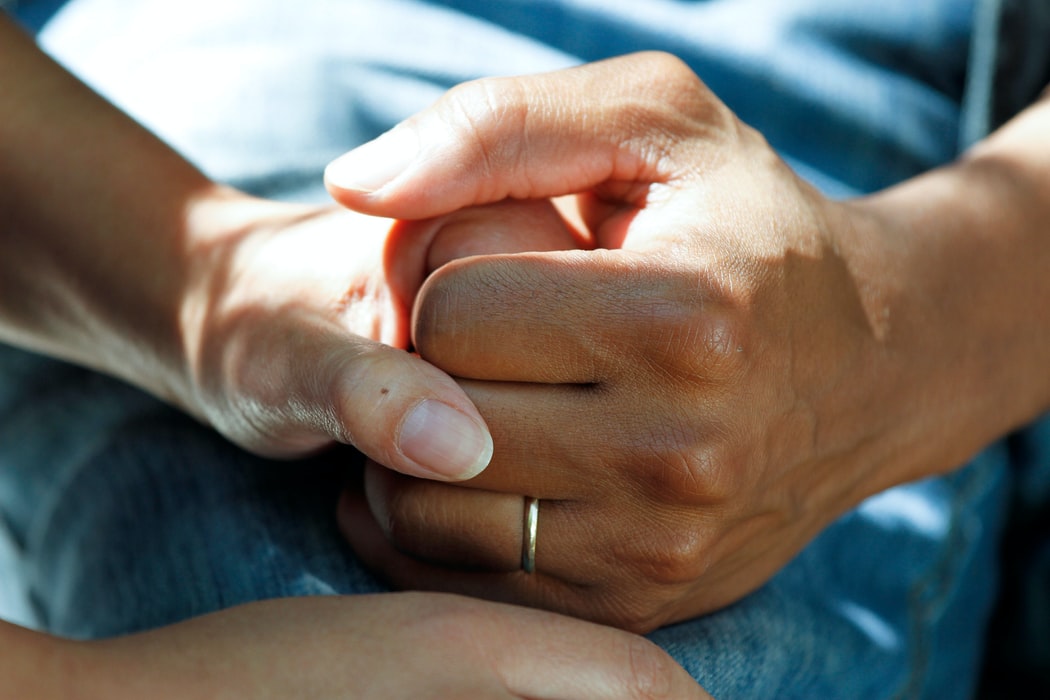 A close up of hands holding