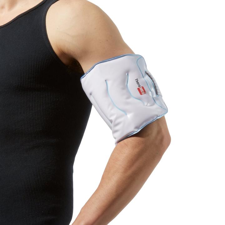 The TheraMed Cold Universal Pad on a man’s upper arm over a white background 