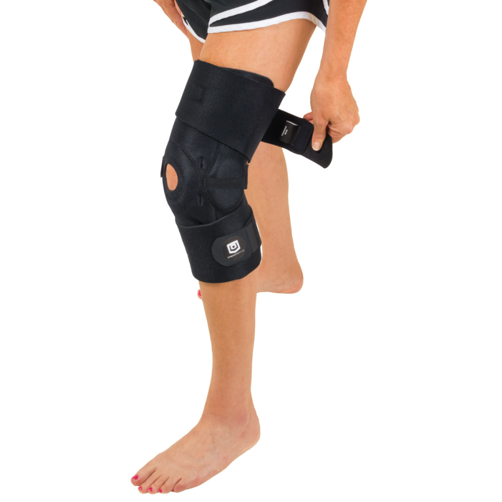 A persons knee with a knee brace on