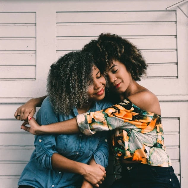 Two women hugging