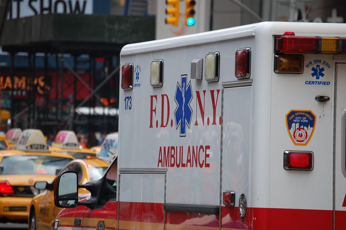 A close up of the side of a New York ambulance