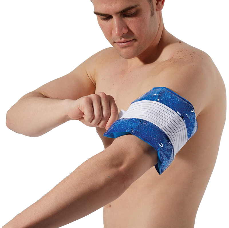 A man tightening a cold pack on his arm