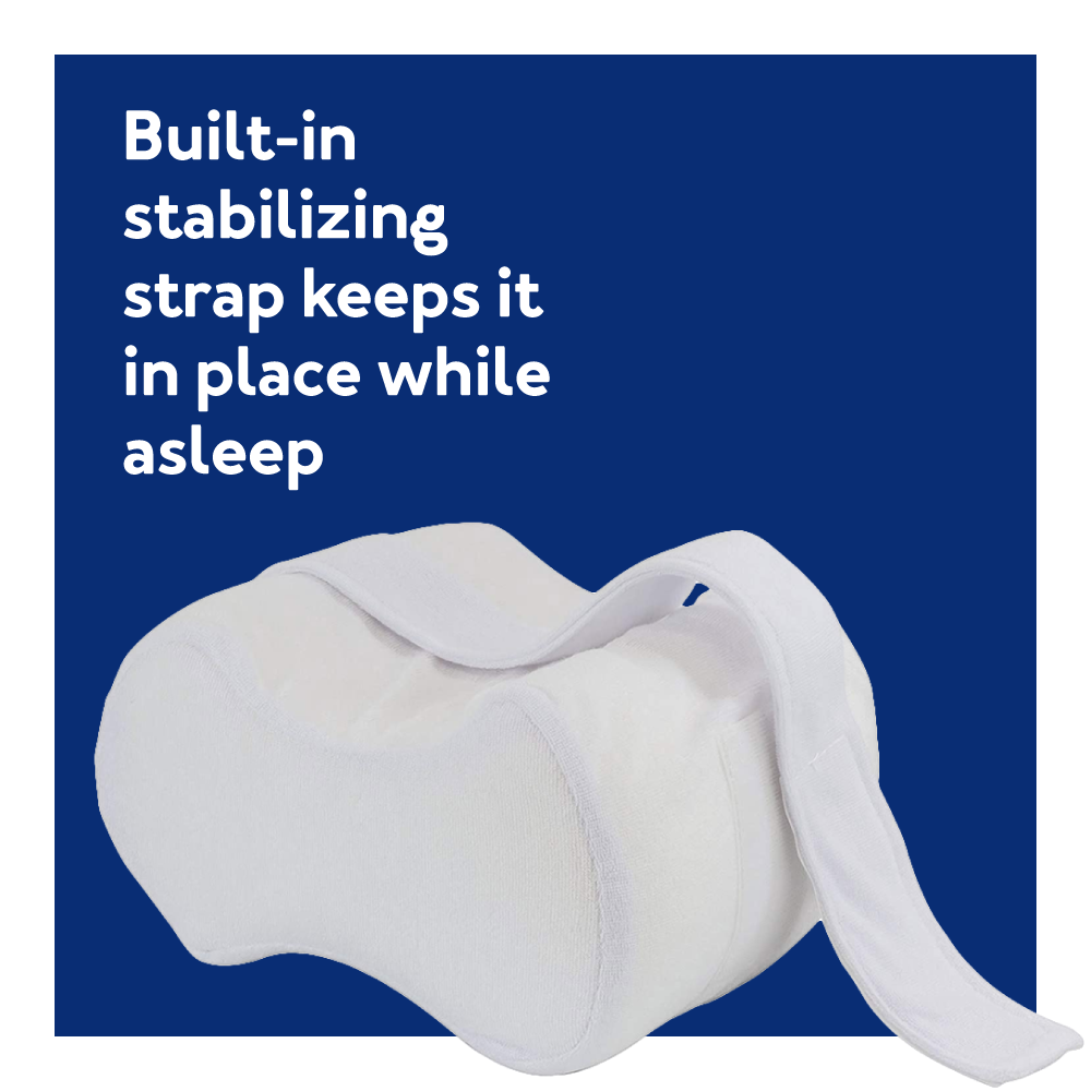 Roscoe Knee Pillow on blue background. Text, Built-in stabilizing strap keeps it in place while asleep.