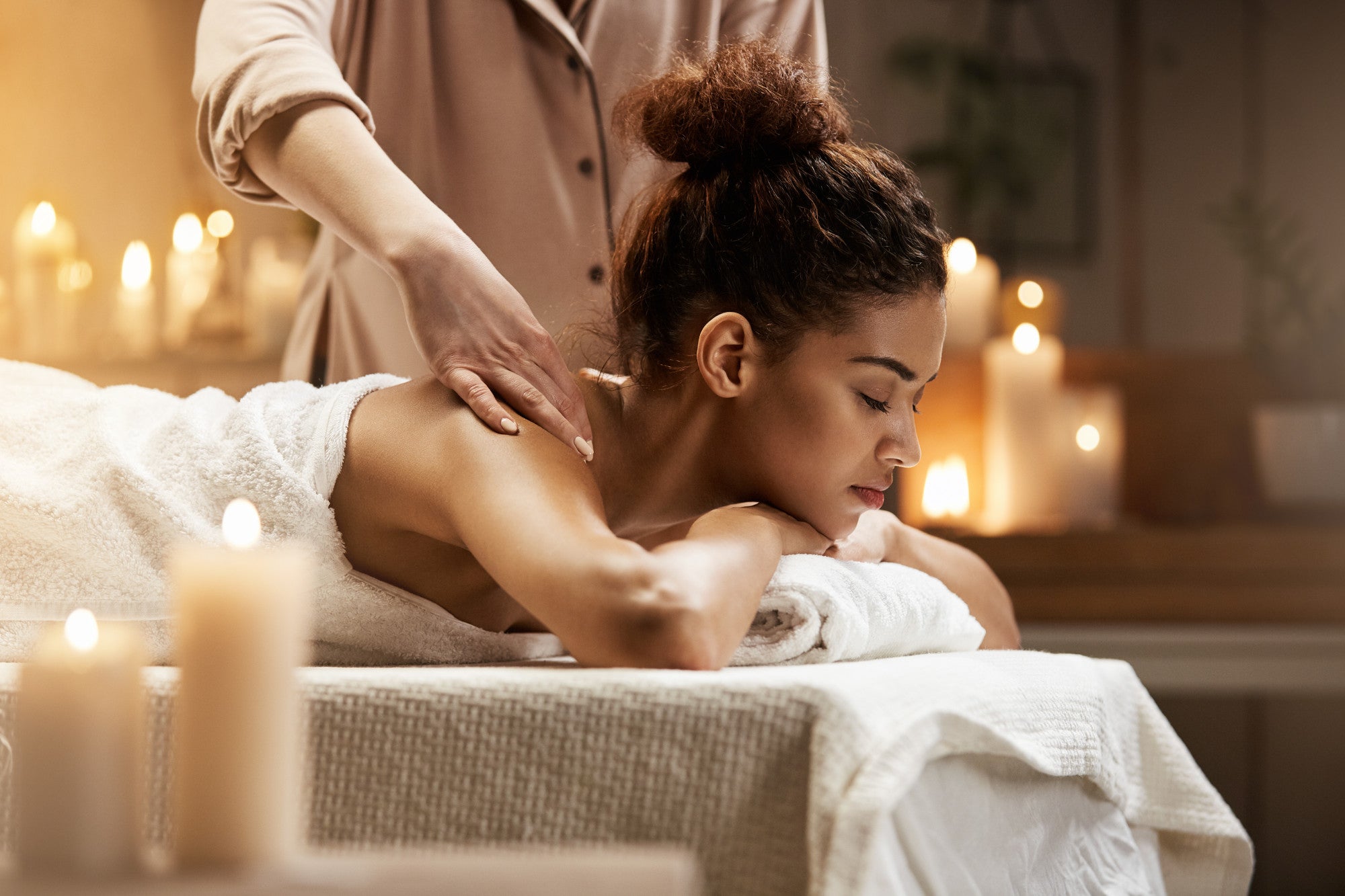 A woman enjoying the benefits of a massage