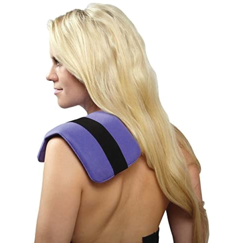 A woman facing away with a hot/cold pack on her shoulder