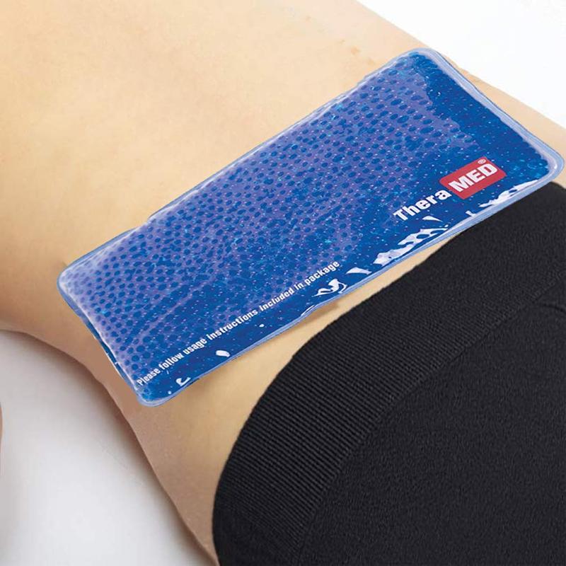 A blue cold pack on a man’s lower back