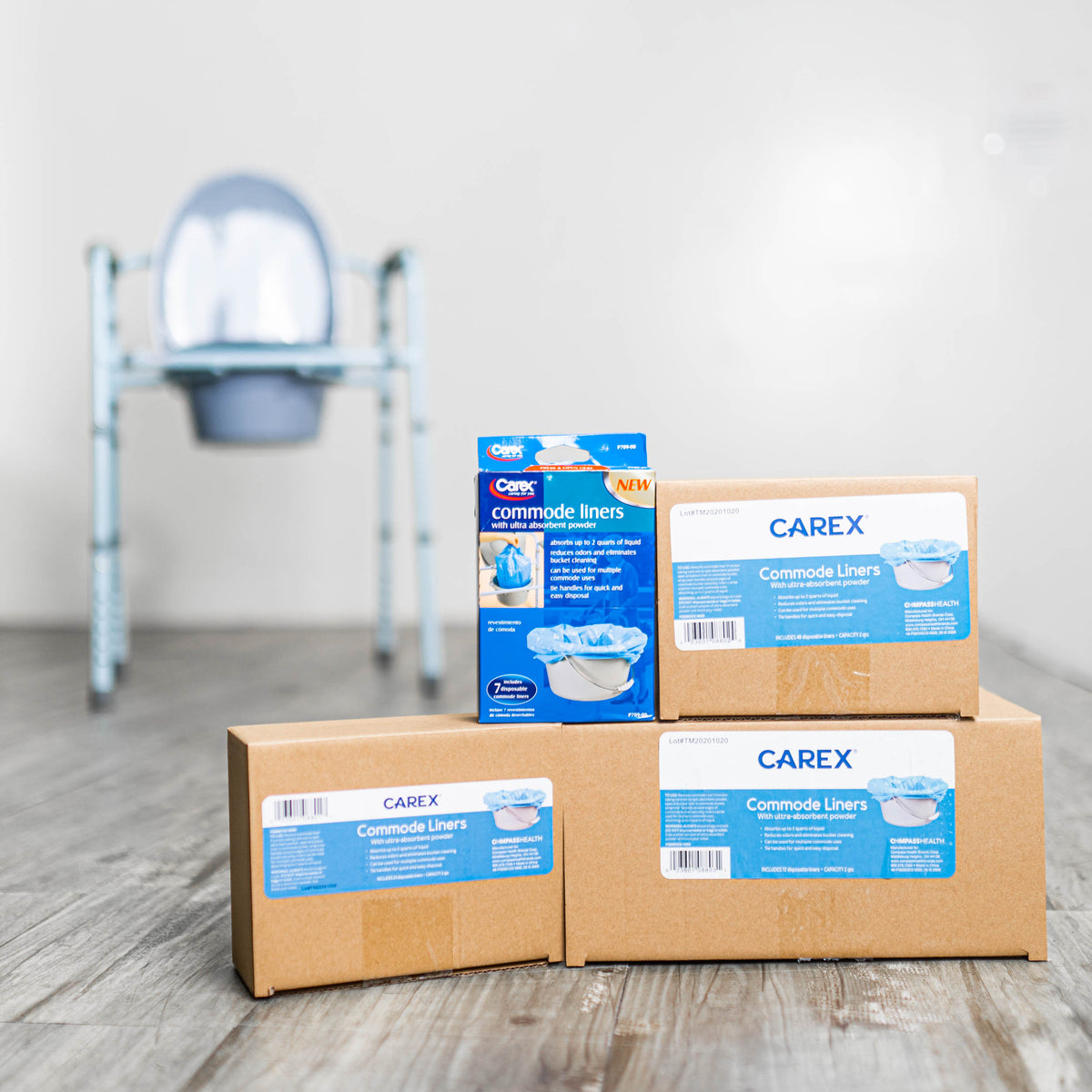 Carex commode liner packaging up close with a commode in the background 