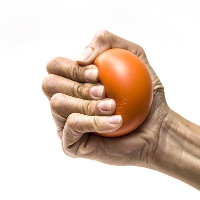A person squeezing a stress ball