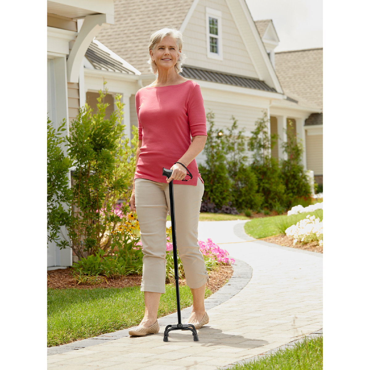 Self standing quad cane