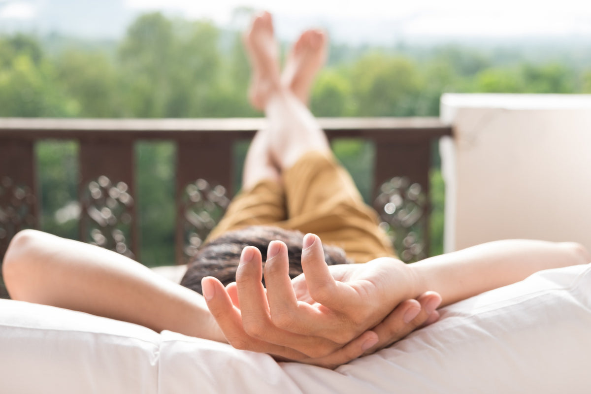 A man relaxing outside