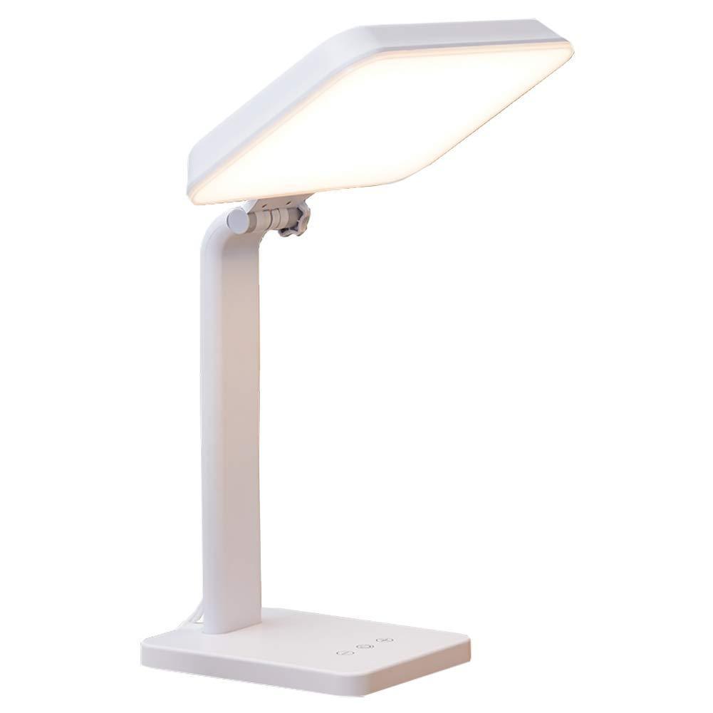 A white therapy lamp with a long neck