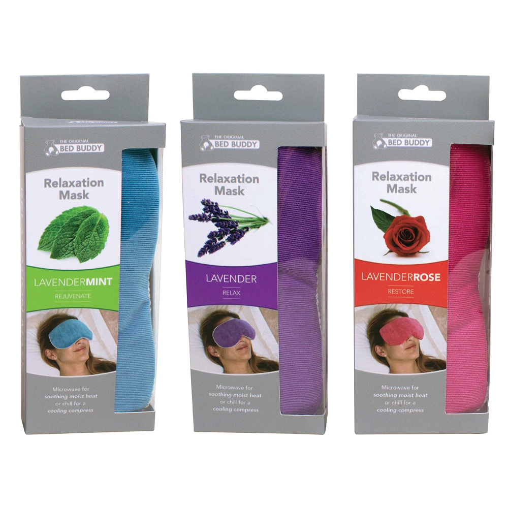 The three Bed Buddy Relaxation Masks variations in their boxes on a white background