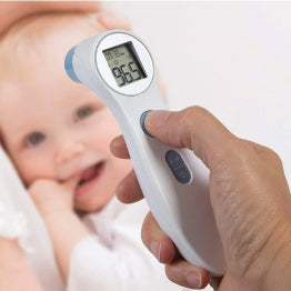 The Roscoe Touchless Forehead Thermometer over the image of a baby