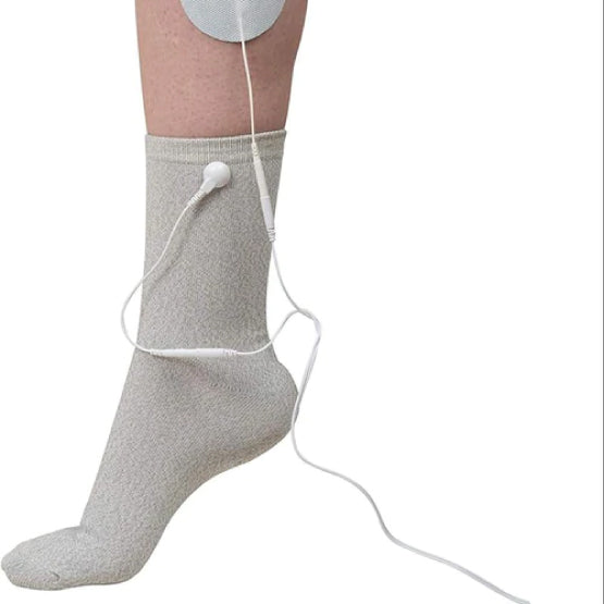 The TENS 7000 Conductive TENS Socks being worn on a white background