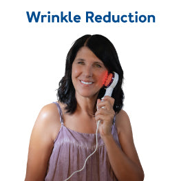 Woman using red light therapy for wrinkles