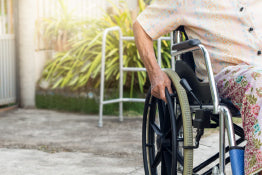 A close up of a wheelchair wheel