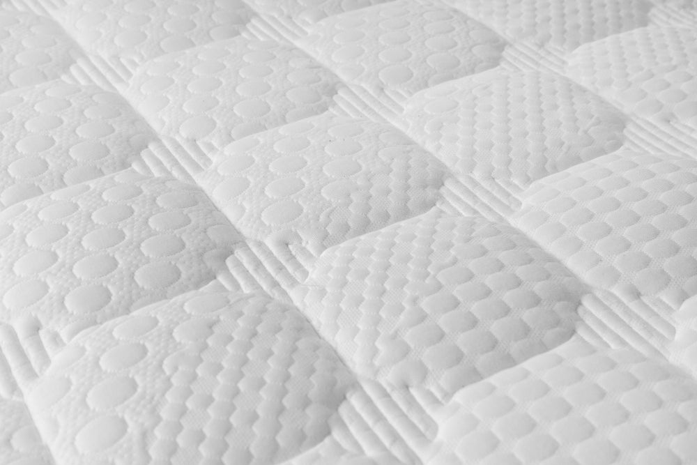 A close up of a mattress