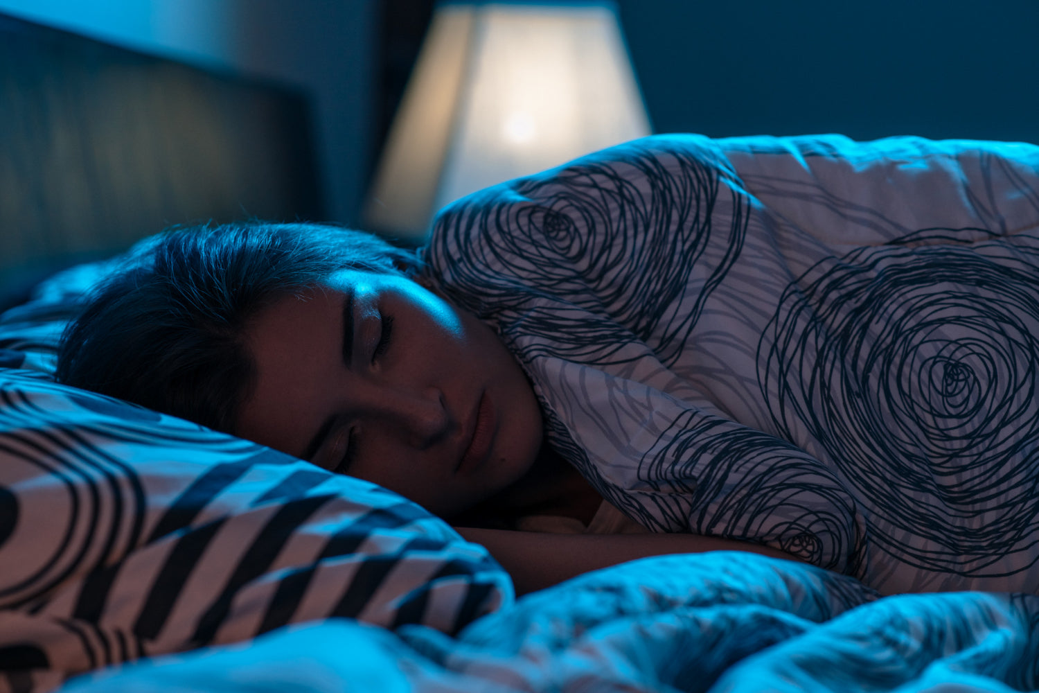 A woman asleep in bed