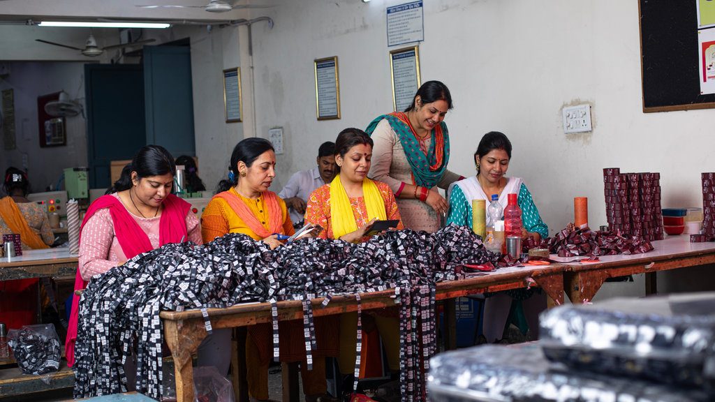 Five female garment workers on the job