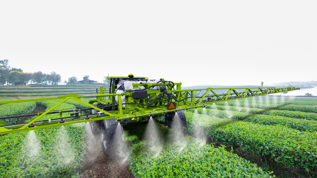Insecticides spray a field