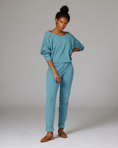 Taylor Jay jumpsuit in a teal blue