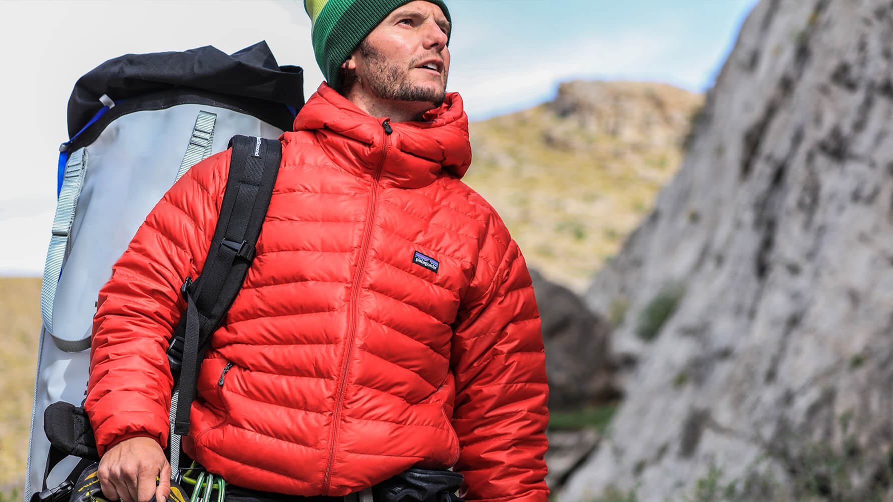 Man hiking wearing gear and outerwear