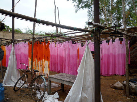 Hand dyed fabrics drying in the sun.