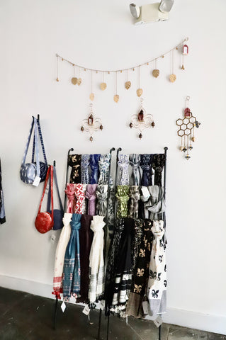 Scarves displayed on a rack