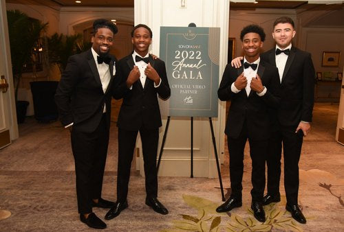 Young men gather for a ceremony