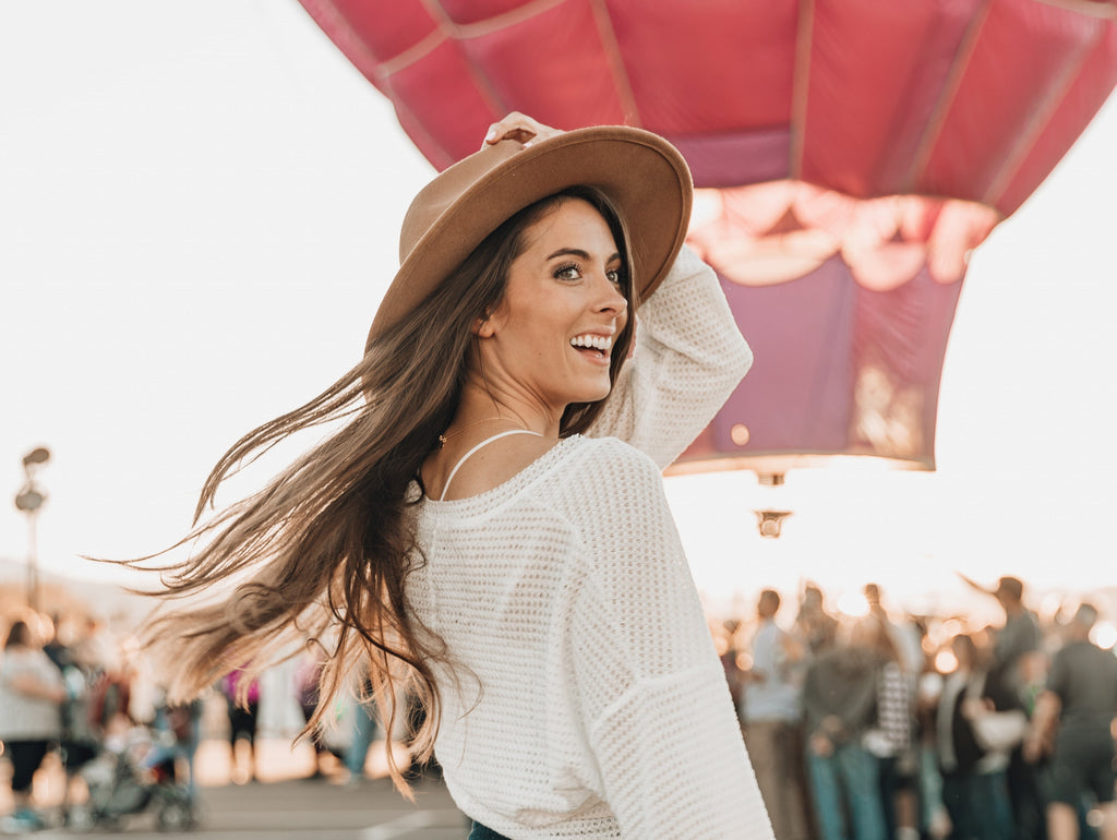 Woman at festival in white top