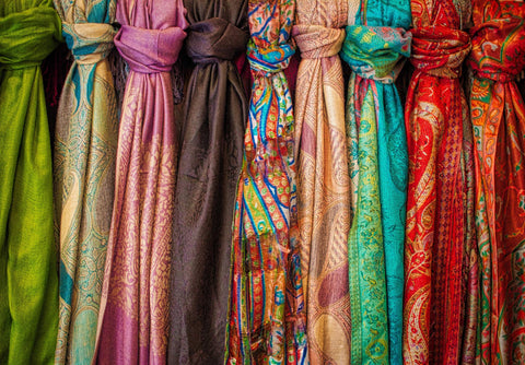 Silk fabrics in a variety of colors and designs, which could have been used to reflect the politics of international trade.