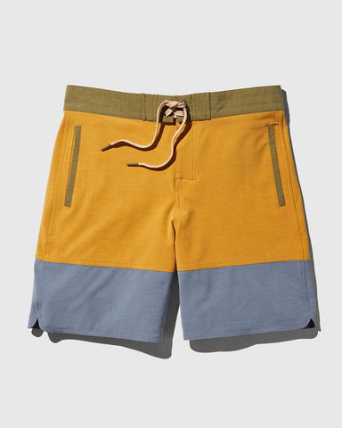 Pair of blue, yellow, and green board shorts