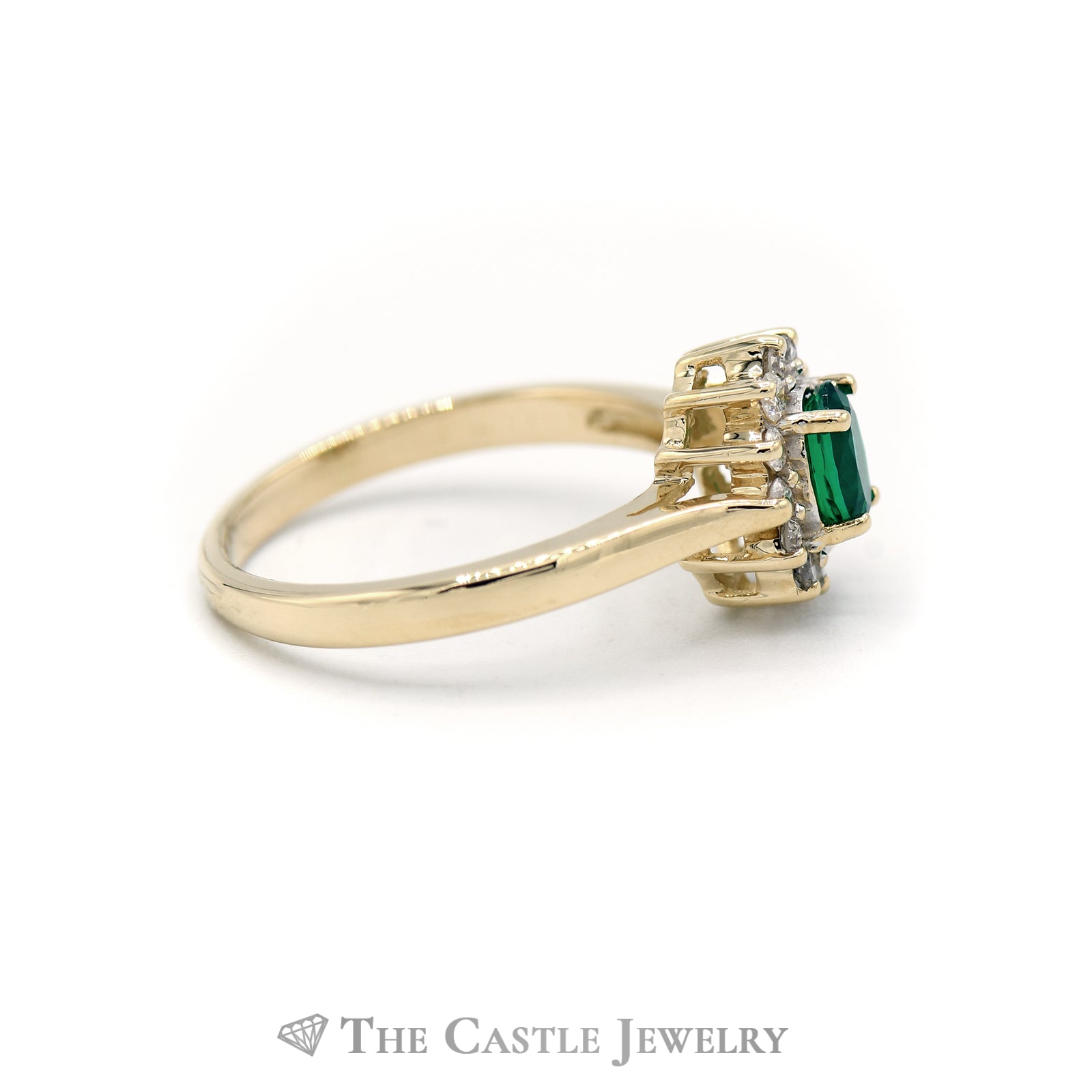 Oval Emerald Cut Ring with Diamond Halo in 14KT Yellow Gold