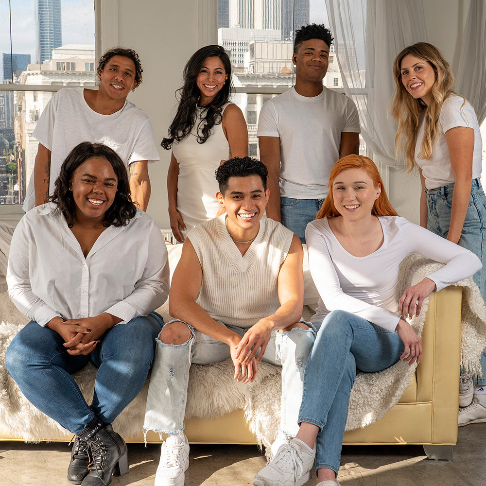 Group photo of diverse people wearing the multiple colors of Go Air Tones True Wireless Earbuds