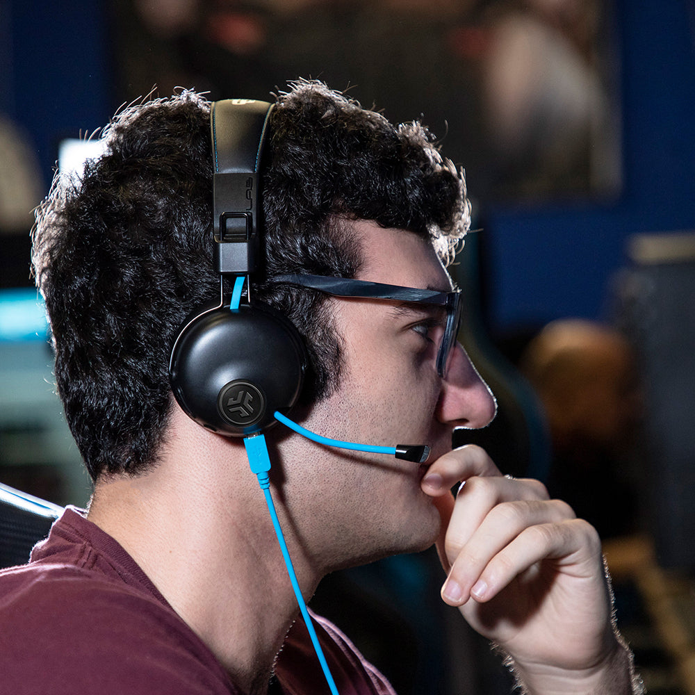 guy wearing play gamer headset