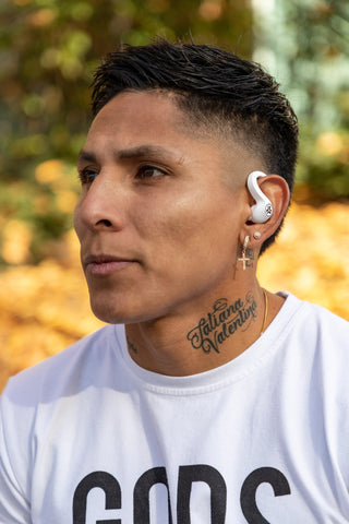 Raul Ruidiaz wearing JBuds Air Sport earbuds in white