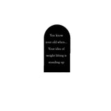 Tombstone black with white writing