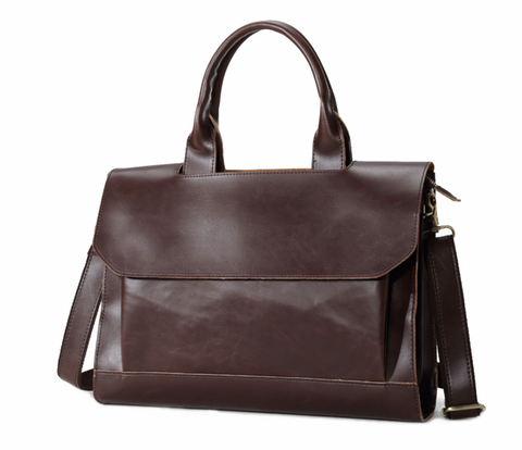 A brown leather-looking briefcase with a large front pocket covered by an unfastened flap.