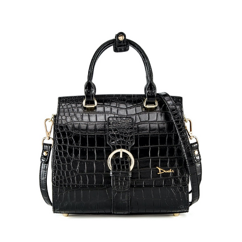 A black bag with alligater print and silver buckles.