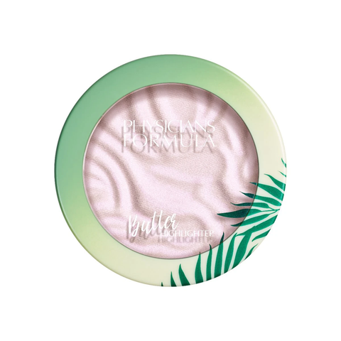 A round green makeup compact with a transparent lid.