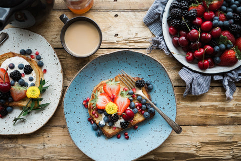 French toast topped with various fruits.