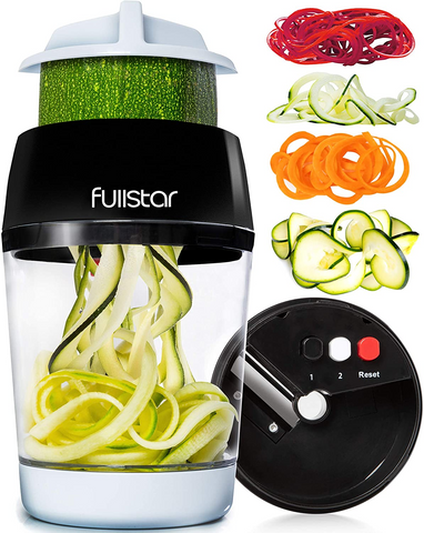 A vegetable spiralizer; a small, hand-operated plastic and metal kitchen gadget with a clear container and blades.