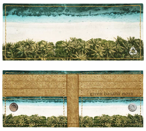 A front and back view of a bifold wallet made from patterned paper depicting a blue sky and banana plants.