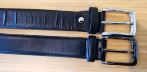 Two belts, one with a silver buckle and one with a black buckle.