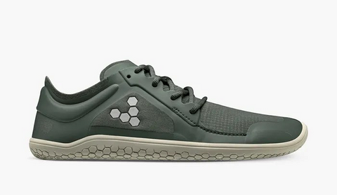 Grey-green casual sneaker with a grey hexagon pattern in the shape of a "V" on the arch.