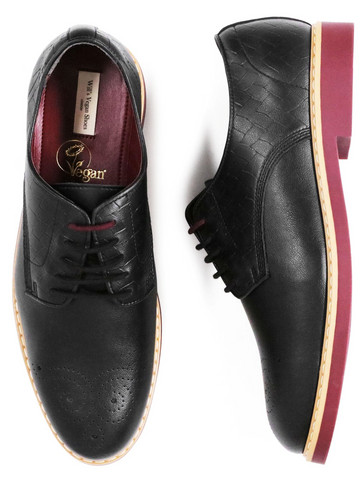 Black lace up men's dress shoes with red soles and heels accented by white edging.