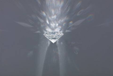 A well-cut diamond will reflect light in a way that enhances its beauty and even makes it look bigger