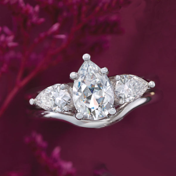 3 stone pear diamond engagement ring